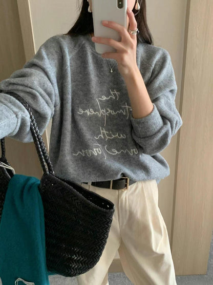 Fluffy "atmosphere" message sweater