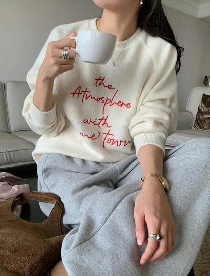 Fluffy "atmosphere" message sweater